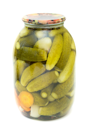 pickled cucumbers in a glass jarの写真素材