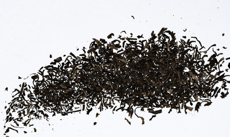 Black tea loose dry on a white backgroundの素材 [FY310129080518]