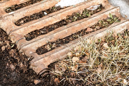 Old iron radiator covered with rustの写真素材