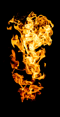 red yellow flames on black backgroundの写真素材
