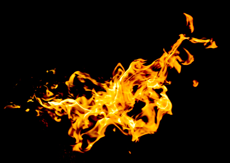 red yellow flames on black backgroundの写真素材