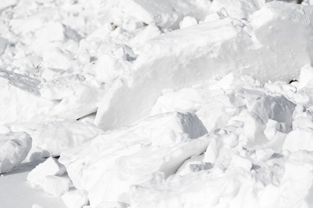 white snow pile lumpsの写真素材