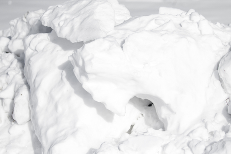 white snow pile lumpsの写真素材