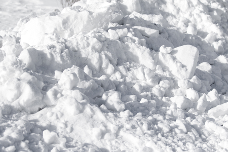 white snow pile lumpsの写真素材