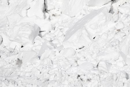 white snow pile lumpsの写真素材