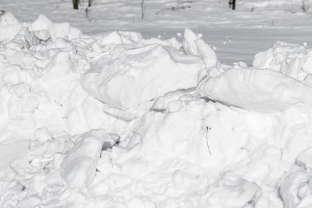 white snow pile lumpsの写真素材