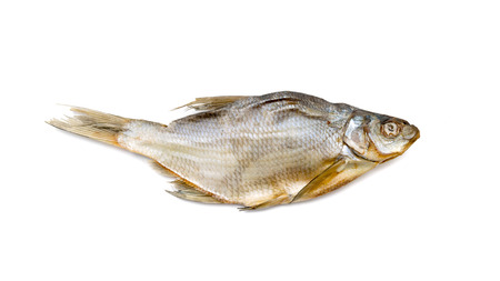 Dried salted fish on a white backgroundの写真素材