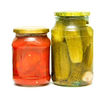 Cucumbers, tomatoes marinated in a glass jarの写真素材