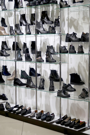Shoes, shoes, boots, on the shelves in the storeの写真素材