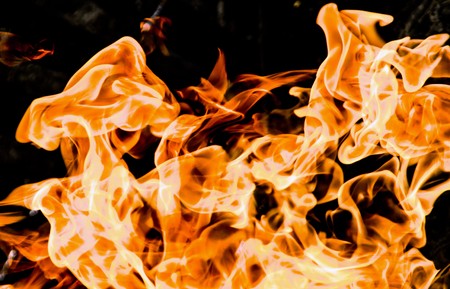 Fire flames on a black backgroundの写真素材