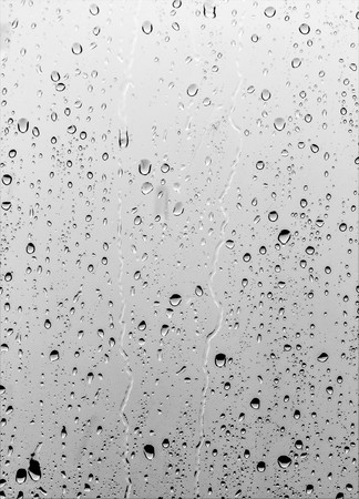 Rain drops on the glass, backgroundの写真素材