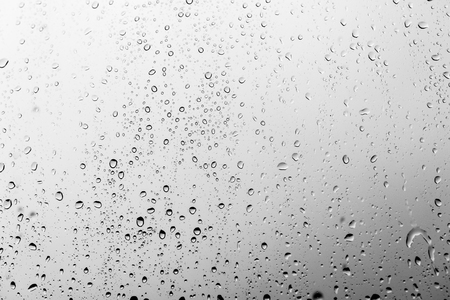 Rain drops on the glass, backgroundの写真素材