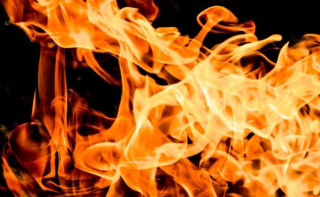 Fire flames on a black backgroundの写真素材