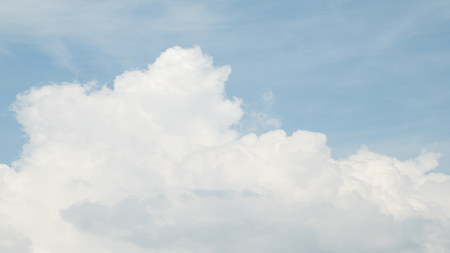 white clouds on a blue sky dayの写真素材