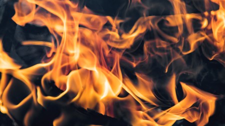 Flame of fire on a black backgroundの写真素材