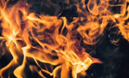 Flame of fire on a black backgroundの写真素材