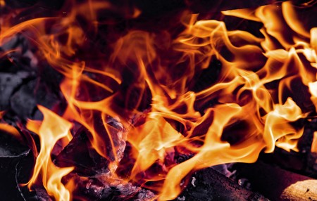 Flame of fire on a black backgroundの写真素材