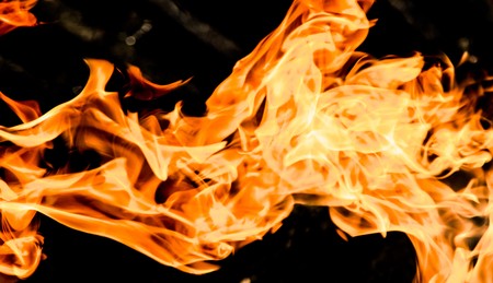 Fire flames on a black backgroundの写真素材