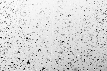 Rain drops on the glass, backgroundの写真素材