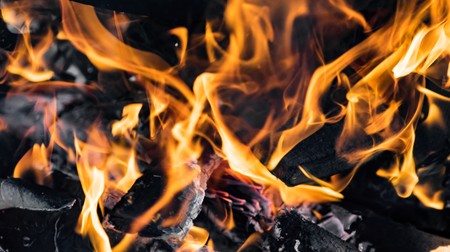 Flame of fire on a black backgroundの写真素材