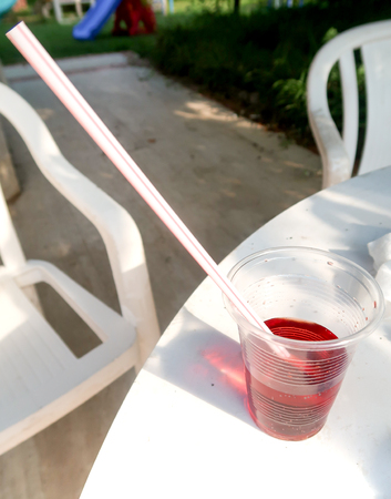 Plastic cup with strawの写真素材