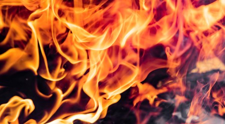 Flame of fire on a black backgroundの写真素材