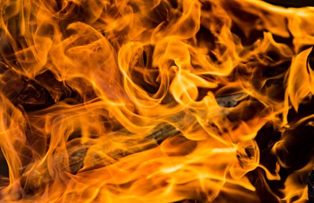 Flame of fire on a black backgroundの写真素材