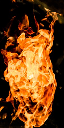 Fire flames on a black backgroundの写真素材
