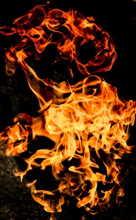 Fire flames on a black backgroundの写真素材