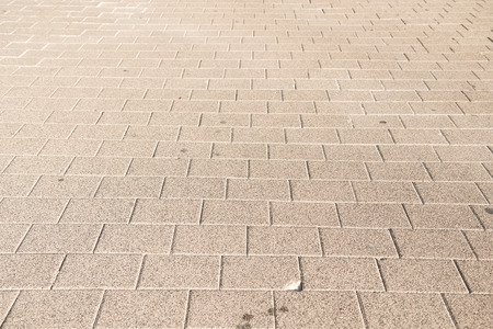 Stone paving stone wall backgroundの写真素材