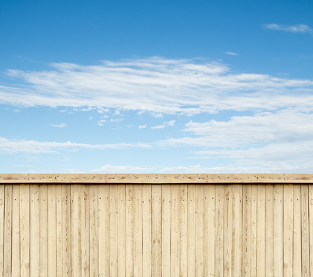 wooden fence sky cloudsの写真素材