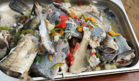 Fish with boiled on a plateの写真素材