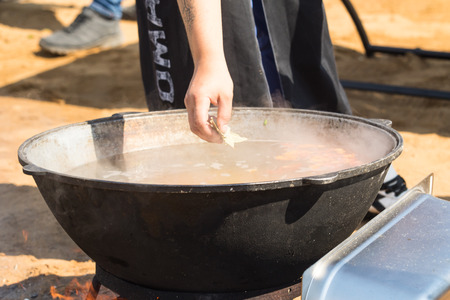 At the stake in the cauldron we cook soupの写真素材