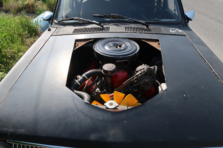 Engine under the hood of retro autoの写真素材