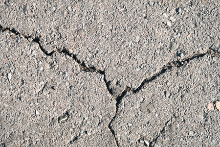 Cracked asphalt background