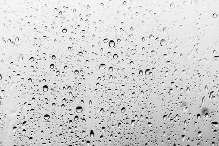 Rain drops on the glass, backgroundの写真素材
