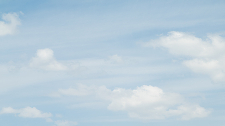white clouds on a blue sky dayの写真素材