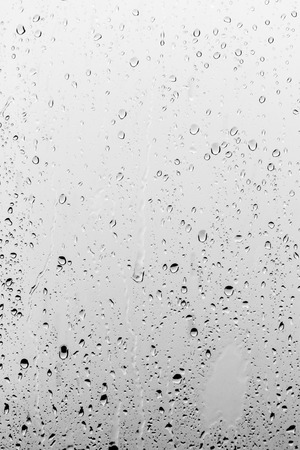 Rain drops on the glass, backgroundの写真素材