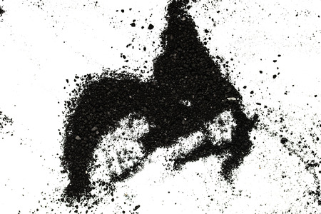 Isolated black powder on a white backgroundの写真素材