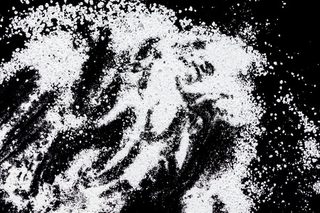 white powder on a black backgroundの写真素材