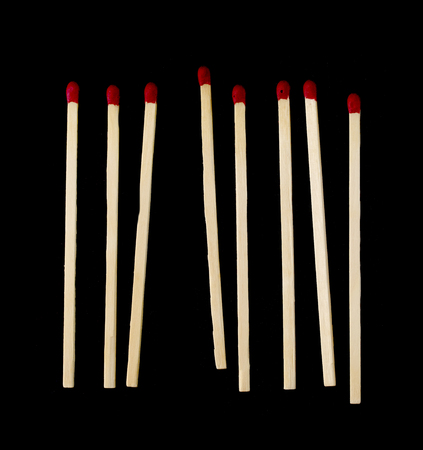 Wooden matches on a black backgroundの写真素材