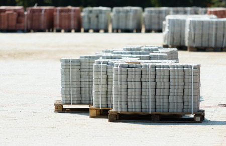 Brick tiles stacked on a palletの写真素材