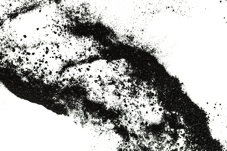 Isolated black powder on a white backgroundの写真素材