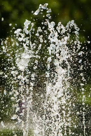 Jets of water fountain, blurry background, abstractionの写真素材