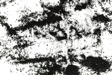 Isolated black powder on a white background