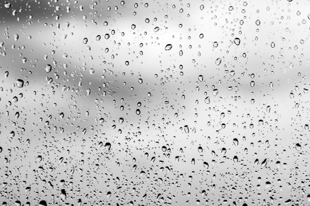 Rain drops on the glass, backgroundの写真素材