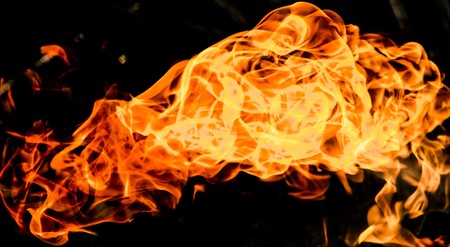 Fire flames on a black backgroundの写真素材