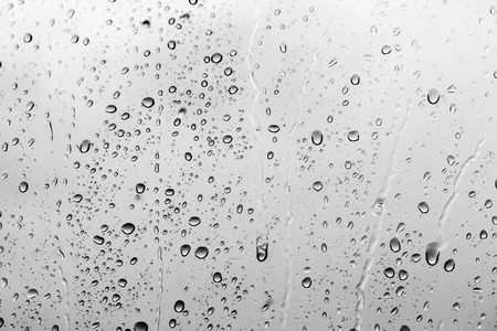 Rain drops on the glass, backgroundの写真素材
