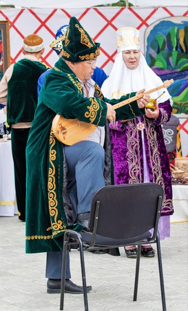 Petropavlovsk, Kazakhstan - August 30, 2017: Kazakhstan marks Constitution Day. People in national costumes, holiday festivities.のeditorial素材