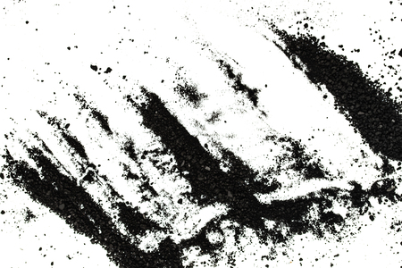 Isolated black powder on a white backgroundの写真素材